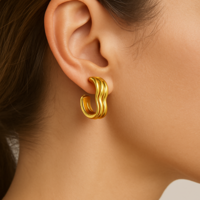 Luminous Golden Wave Hoops