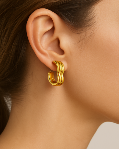 Luminous Golden Wave Hoops